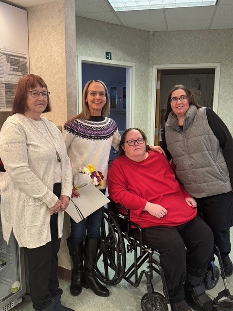 Laura Rizzo Bracey, second from left, is congratulated by some of the colleagues and patients who nominated her for the DAISY Lifetime Achievement Award, one of the highest honors presented by The DAISY Foundation to recognize nurses who have devoted their life’s work to compassionate, exemplary patient care and to advancing the nursing profession. Bracey was presented recently with the honor during a surprise ceremony surrounded by coworkers and patients.