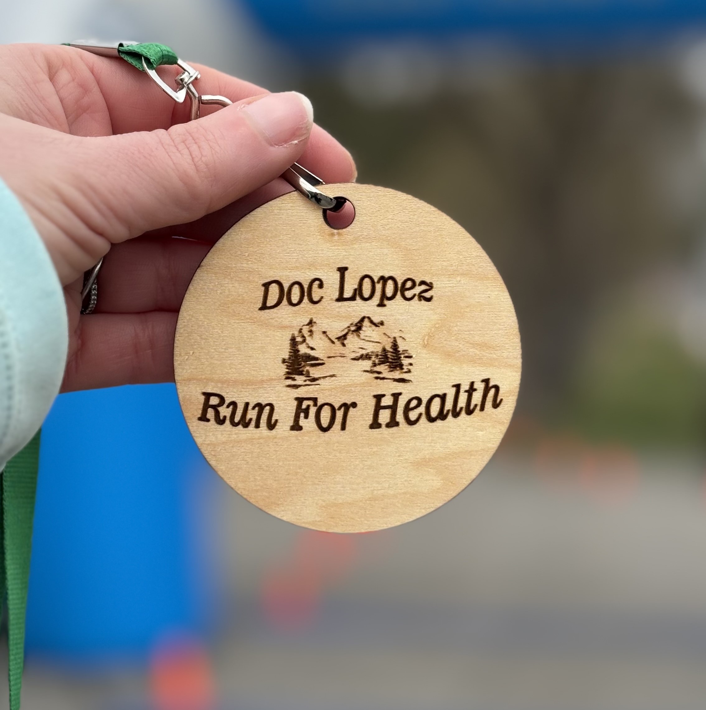 Up close on a badge of the doc lopez run for health.