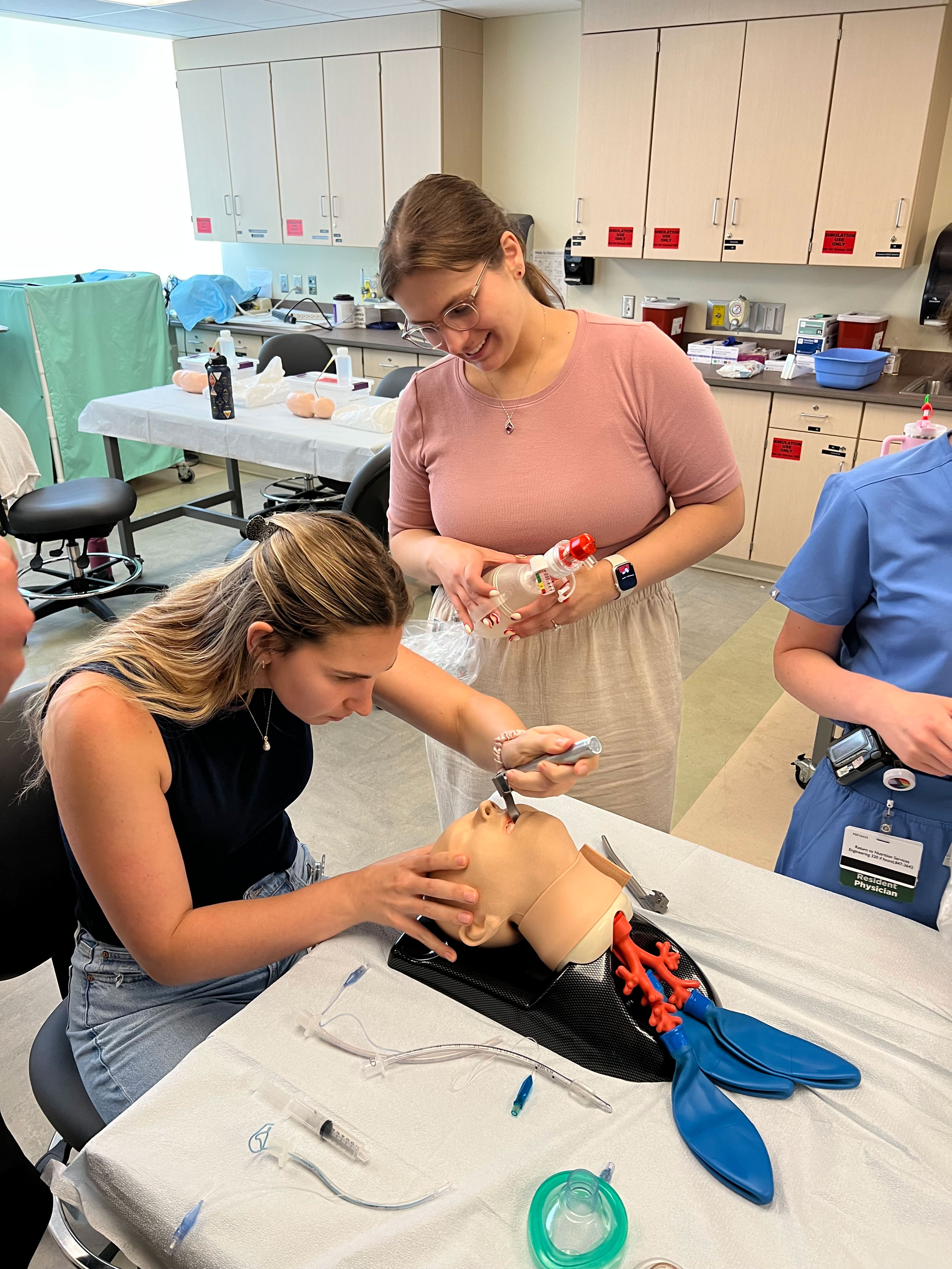 GME Pediatric residents working in sim lab