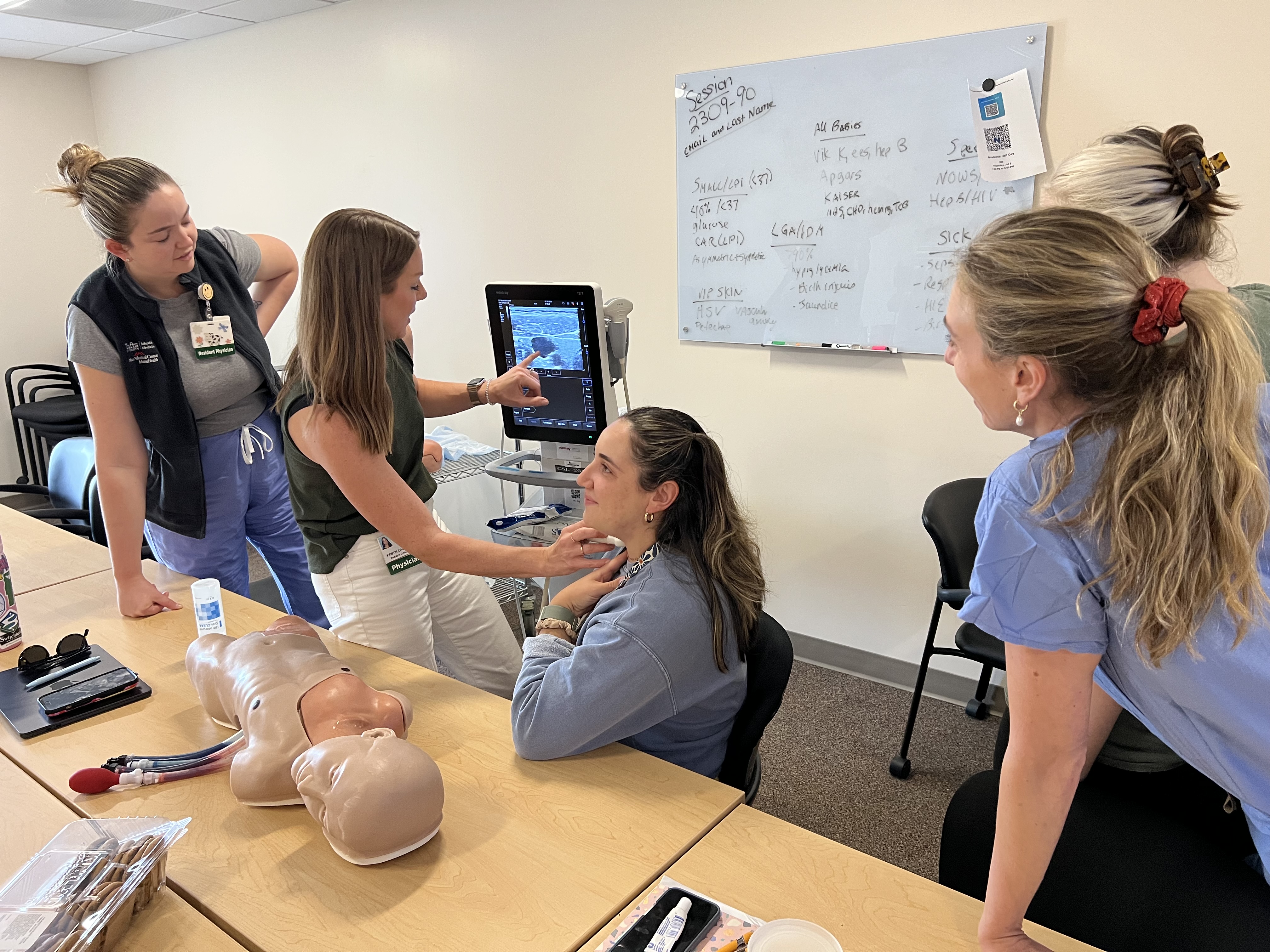 GME Pediatric residents working in sim lab