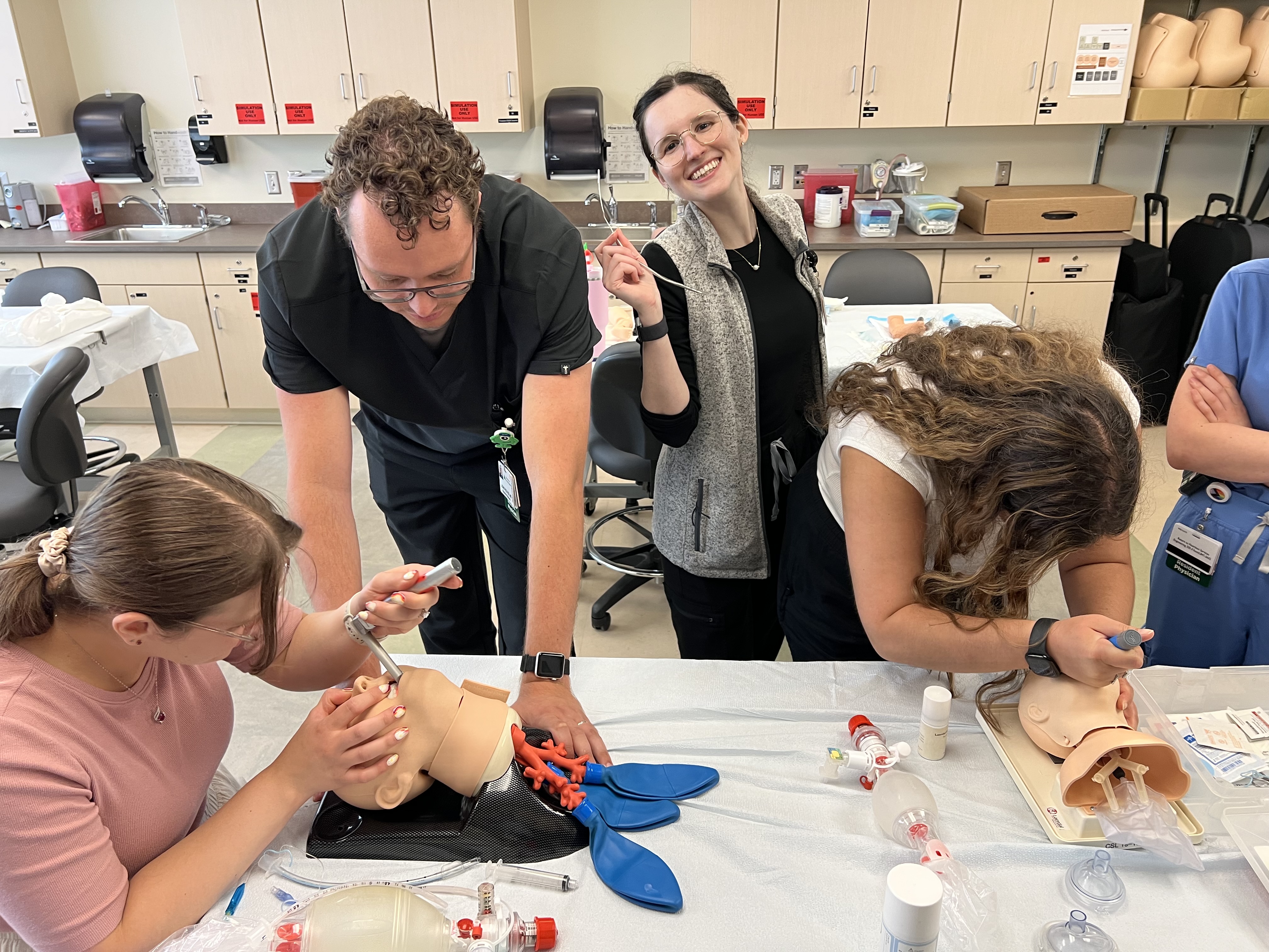 GME Pediatric residents working in sim lab