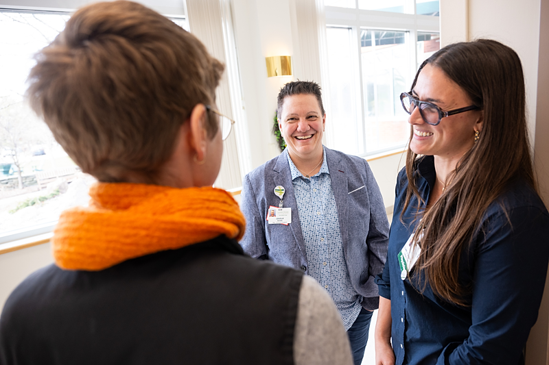 Clare O'Grady, DO talks with interprofessional team at Porter Medical Center