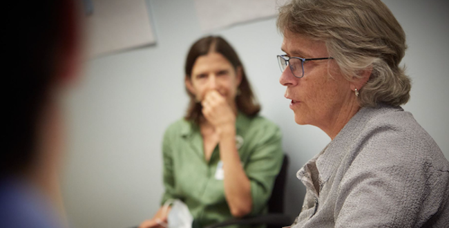 Hospice & Palliative Care provider speaking in a group circle.