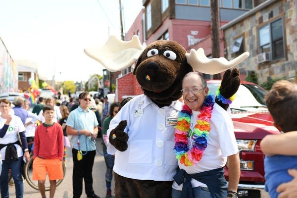 Monty the Moose mascot with Dr. Lewis First