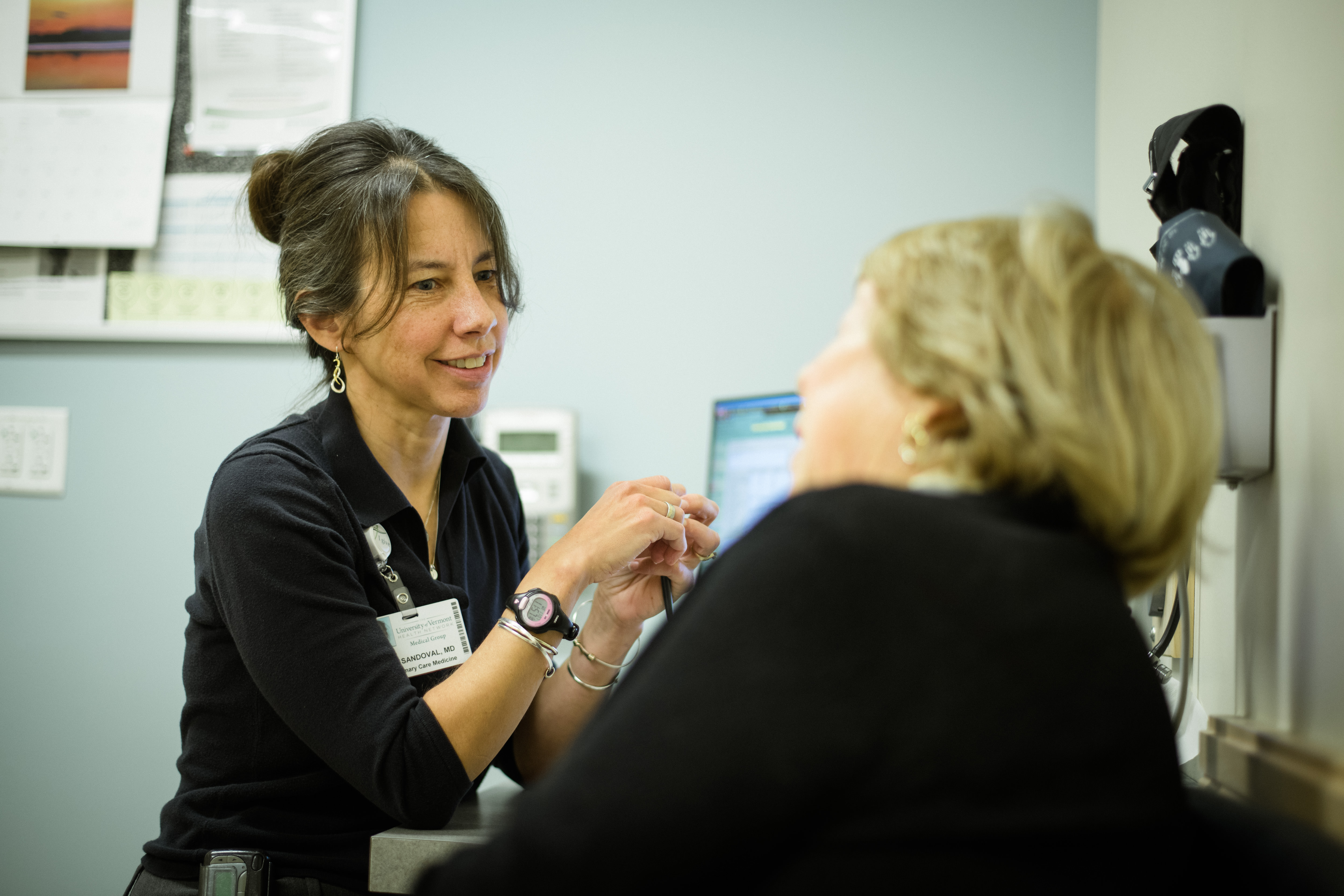 Dr. Sandoval talking with patient
