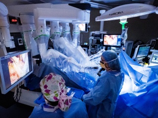 A physician watches a screen during an operation with the DaVinci surgical robot at the University of Vermont Medical Center. 