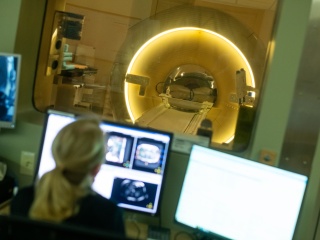 Radiologist looks at images from a MRI