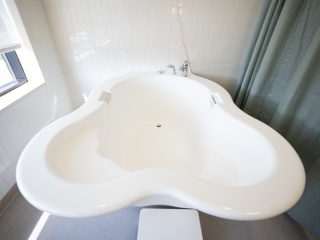 A close-up of a tub for water births.