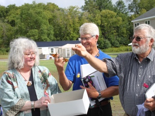 Family releases monarch butterflies at the Jack and Inge Hinman Walkway dedication at The Alice Center