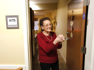 Resident gives a tour of their room at Alice Hyde Medical Center’s Alice Center Assisted Living in Malone, NY.