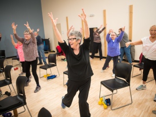 A group of patients exercise.