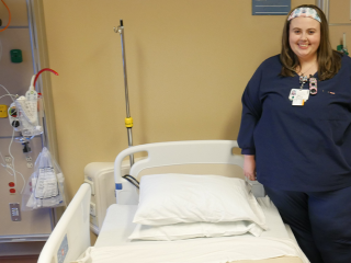 Nurse Emily Estus in a patient room at Champlain Valley Physicians Hospital.