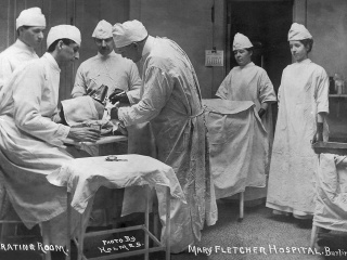 Historical photo of a surgery at Mary Fletcher Hospital in Burlington, Vt.