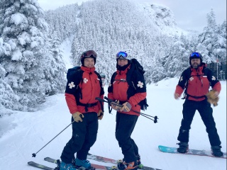 Jamie Carroll and the Stowe Mountain Resort Ski Patrol team.