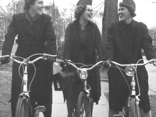 Historical photo of VNA nurses riding bicycles.