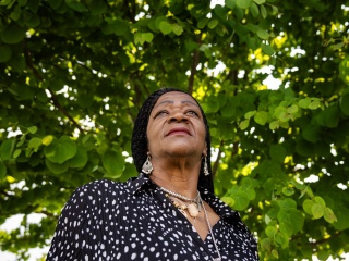 Portrait of Phyillicia Laboard under a tree.