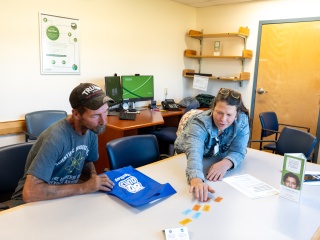 Patient Aaron Blair works with Alice Spirito, RN, and Peggy Weaver, LADC, during a regular check-in at his primary care office in Milton, Vermont.