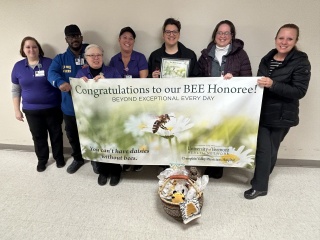 Geri Kaplan-Downs, who works in nutrition and patient accounting at Champlain Valley Physicians Hospital, was surprised as the most recent BEE Award honoree during a ceremony with her co-workers. 