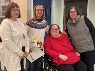 Laura Rizzo Bracey, second from left, is congratulated by some of the colleagues and patients who nominated her for the DAISY Lifetime Achievement Award, one of the highest honors presented by The DAISY Foundation to recognize nurses who have devoted their life’s work to compassionate, exemplary patient care and to advancing the nursing profession. Bracey was presented recently with the honor during a surprise ceremony surrounded by coworkers and patients.