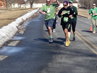 Runners, decked in their finest St. Patrick’s Day garb, complete the Shamrock Shuffle 5k run held in 2025.  This year, the annual event sponsored by the Foundation of CVPH and Adirondack Coast Events, will benefit University of Vermont Health – Champlain Valley Physicians Hospital’s (CVPH) Child and Adolescent Inpatient Psychiatry Unit.