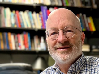 Portrait of Steven Schlozman, MD, chief of the division of child and adolescent psychiatry for UVM Health.