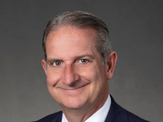 Portrait photo of Marc Kosak.