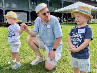 A family attends the Golisano Children's Hospital NICU reunion at Shelburne Farms.