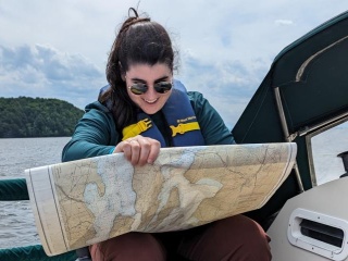 Palliative Care Fellow reads a map while on an Academic Half Day event