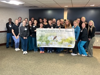 Billie Pearl, an occupational therapist at Champlain Valley Physicians Hospital, was surprised as the hospital’s most recent BEE Award honoree during a ceremony with coworkers. 