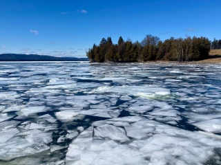 Water in Lake Champlain frozen with ice.