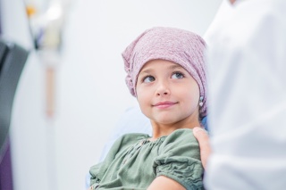 Portrait photo of a young cancer patient. 