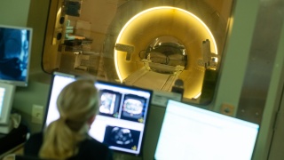 Radiologist looks at images from a MRI