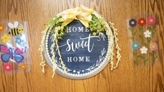 Close-up of a sign that says home sweet home.