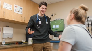 Porter Medical Center provider talks with a patient in primary care.