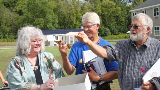 Family releases monarch butterflies at the Jack and Inge Hinman Walkway dedication at The Alice Center