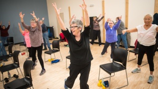 A group of patients exercise.