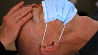 A patient gets reiki at the University of Vermont Medical Center's Comprehensive Pain Program.