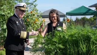 Adm. Rachel Levine, MD, tours the Culinary Medicine garden at UVM Medical Center.