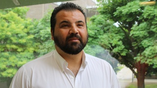 Portrait of Dragos Banu, a primary care doctor with UVM Health.