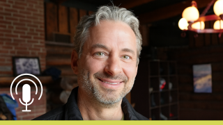 Candid photo of a man staring at the photo.