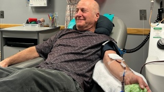 Patient donates blood during blood drive