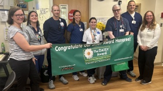 The walter rooks daisy team poses for a photo.