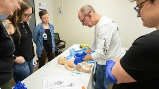 Laura Mulvey, MD, and a team of emergency medicine staff from University of Vermont Medical Center hold an OB training at Grace Cottage Family Health & Hospital.