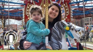 Alexa Valyou and her mother ride a merry-go-round.