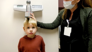 A pediatric patient has his height measured at Alice Hyde Medical Center Pediatrics in Malone, NY.