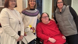 Laura Rizzo Bracey, second from left, is congratulated by some of the colleagues and patients who nominated her for the DAISY Lifetime Achievement Award, one of the highest honors presented by The DAISY Foundation to recognize nurses who have devoted their life’s work to compassionate, exemplary patient care and to advancing the nursing profession. Bracey was presented recently with the honor during a surprise ceremony surrounded by coworkers and patients.