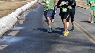 Runners, decked in their finest St. Patrick’s Day garb, complete the Shamrock Shuffle 5k run held in 2025.  This year, the annual event sponsored by the Foundation of CVPH and Adirondack Coast Events, will benefit University of Vermont Health – Champlain Valley Physicians Hospital’s (CVPH) Child and Adolescent Inpatient Psychiatry Unit.