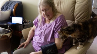 Laurel Schoop takes her blood pressure at home with automated devices provided by University of Vermont Health - Home Health & Hospice’s Remote Patient Monitoring Program.