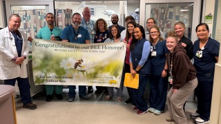Scott Charette, a pharmacist at Champlain Valley Physicians Hospital, was surprised as the most recent BEE Award honoree during a ceremony with his Emergency Department co-workers.