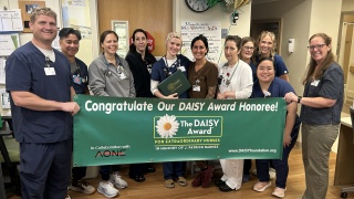 he medical-surgical team on R6 at Champlain Valley Physicians Hospital celebrates the DAISY Award presented to colleague Christina Rumyantseva, RN during a surprise ceremony.